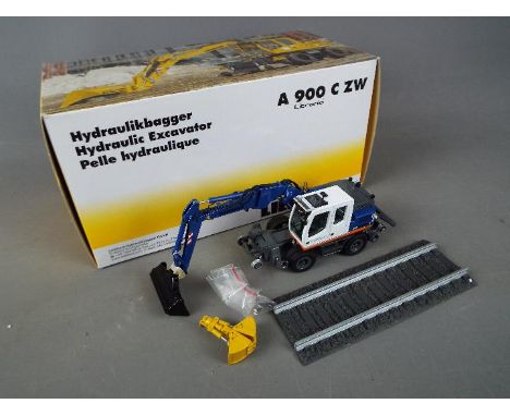 NZG - A boxed diecast 1:50 scale NZG #803/04 Liebherr Litronic A900 C ZW Hydraulic Excavator . The model appears to be in Min