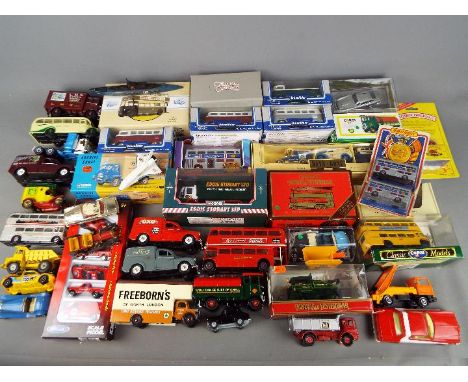 Corgi, Matchbox, Welly, Lledo, Solido, Others - Approximately 20 boxed model vehicles with a quantity of unboxed diecast. Lot