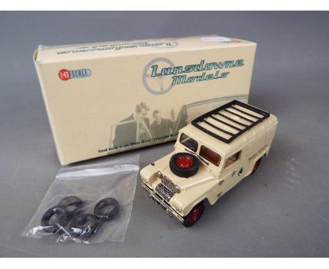 Lansdowne Models - A boxed Lansdowne Models LDM.40 1:43 scale Austin Gipsy LWB Hard Top. The model in cream with red wheels a