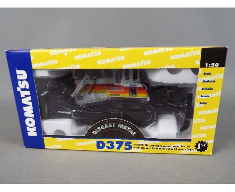 First Gear - A boxed First Gear 1:50 scale diecast Komatsu D375 Bulldozer. The model appears to be in Mint condition and is p