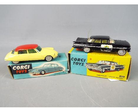 Corgi Toys - Two boxed diecast vehicles by Corgi Toys. Lot contains Corgi #223 Chevrolet State Patrol which appears to be in 