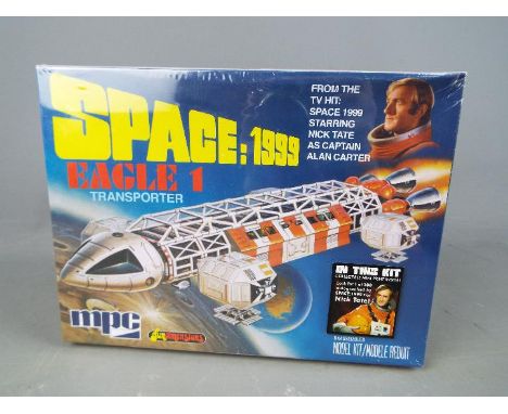 Space 1999 - a Space 1999 Eagle 1 Transporter model kit from the hit TV series Space 1999, includes a collectable mini print,