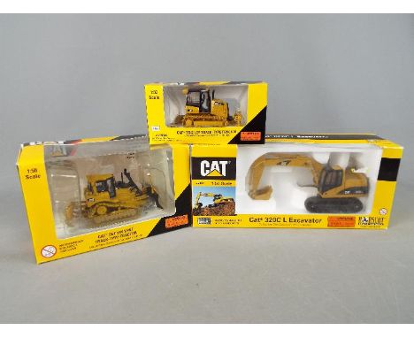 Norscot - A collection of three boxed 1:50 scale diecast construction vehicles by Norscot. Lot includes #55281 Caterpillar D5