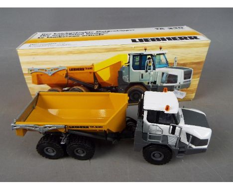 Conrad - A boxed diecast 1:50 scale Conrad #2728 Liebherr TA 230 Litronic Articulated Dumper. The model appears to be in Mint