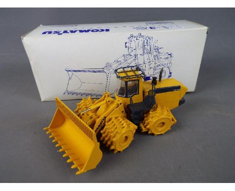 Conrad - A boxed diecast 1:50 scale Conrad #2437 Komatsu WA-3 Compactor. The model appears to be in Mint condition and is pre