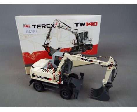 NZG - A boxed diecast 1:50 scale NZG #697 Terex TW140 Mobile Excavator. The model in grey and black appears to be in Mint con