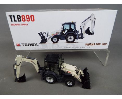 NZG - A boxed diecast 1:50 scale NZG #915 Terex TLB890 Backhoe Loader. The model in grey and black appears to be in Mint cond