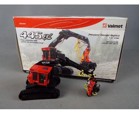 Sword Models - A boxed diecast 1:50 scale Valmet 445 EXL Track Harvester with Valmet 385 Harvesting Head. The model appears t