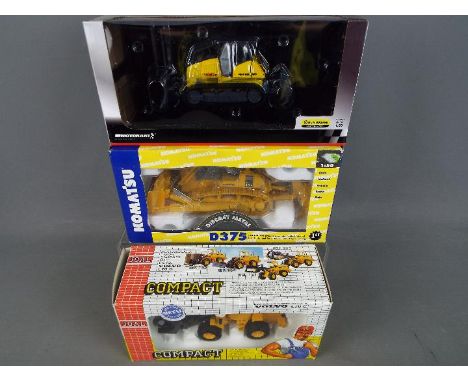 First Gear, Motorart, Joal - Three boxed diecast 1:50 scale construction vehicles. Lot includes Joal #235 Volvo L70C; Motorar