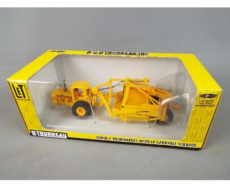Spec Cast - A boxed diecast 1:50 scale Spec Cast R.G. Le Tourneau Inc. Super C Tournapull with LP Carryall Scraper. The model
