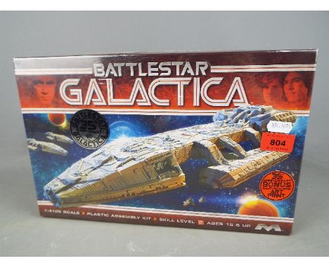 Battlestar Galactica - a 1:4105 scale plastic assembly kit , skill level 3 by Moebius Models with 35th Anniversary bonus Ralp