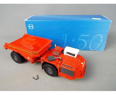 Conrad - A boxed diecast 1:50 scale Conrad #2729 Sandvik TH550 Underground mining Dump Truck. The model appears to be in Mint