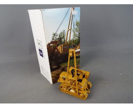 Conrad - A boxed Conrad # 2875/01 1:50 scale diecast Caterpillar 583 Pipelayer Spiecapag. The model appears to be in Mint con