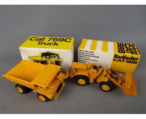 NZG -Two boxed diecast 1:50 scale scale construction vehicles by NZG. The lot consists of NZG #134 Caterpillar 988 Radlader, 