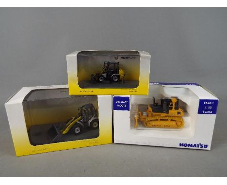 Universal Hobbies - Three boxed diecast construction vehicles in 1:50 scale from Universal Hobbies. Including #8067 Kramer 11