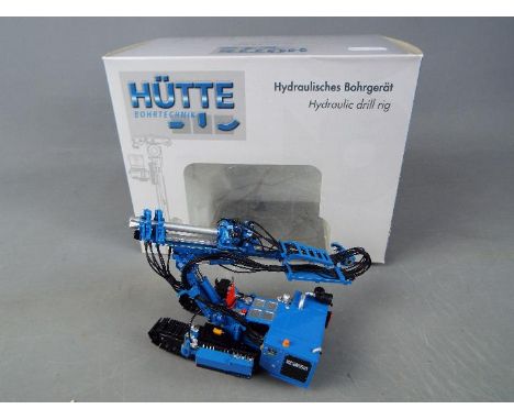 ROS Models - A boxed diecast 1:50 scale Hutte HBR 605 Hydraulic Drill Rig by ROS Models. The model appears to be in Mint cond