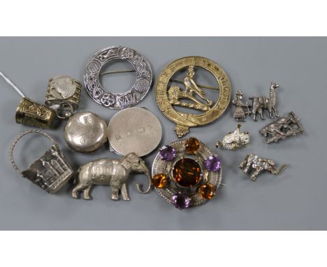 An Asprey's circular engine-turned silver novelty penknife, London 1956 and sundry small silver and other items, including a 