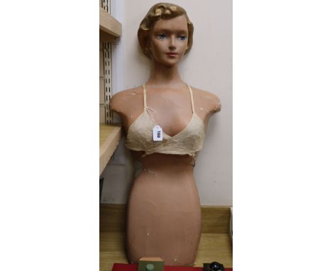 A 1940's/50's composition mannequin three quarter height
