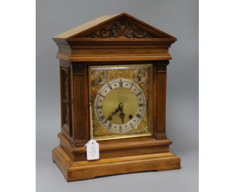 An Edwardian walnut mantel clock height 41cm