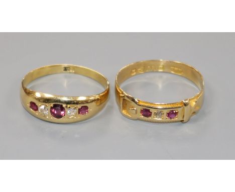 Two 18ct gold, ruby and diamond set rings, including a late Victorian buckle ring.