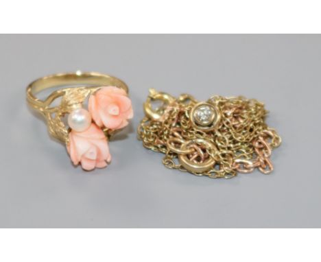 A 14k gold, carved coral and cultured pearl set dress ring, a diamond set pendant necklace and a bracelet.