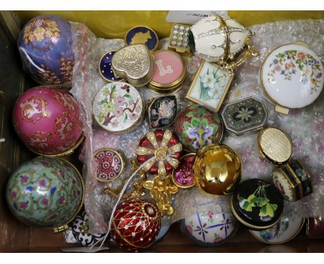 A collection of enamelled patch and trinket boxes, including two Faberge style egg paste-set examples and a crown