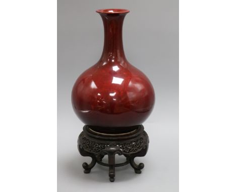 A Chinese Langyao bottle vase, Kangxi period, restored, wood stand height 29cm excl. stand