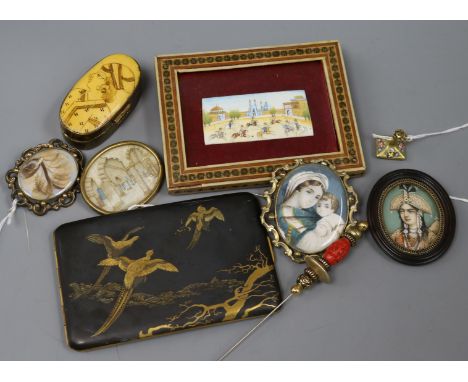 A 19th century hairwork memorial brooch in scrolled frame and sundry items, including a Japanese black and gold lacquered cig
