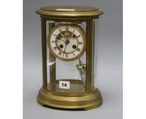 An oval four glass mantel clock height 21cm
