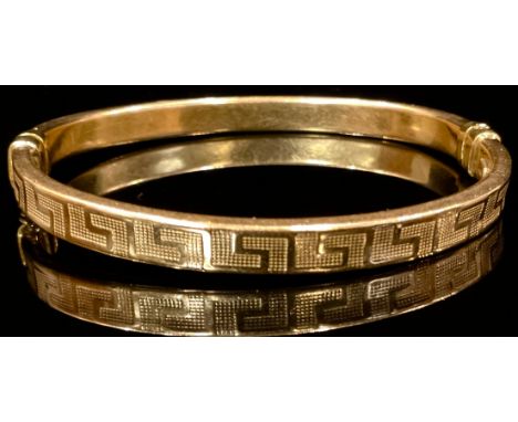 A 9ct gold Hollow Greek Key hinge bangle, 8.2g 