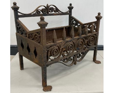 A Victorian forged and cast iron fire grate / fire basket, 52.5cm high x 61cm wide x 39cm, c.1850. 