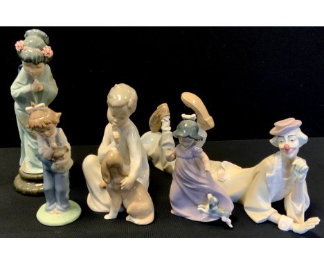 A Lladro pottery figure, Recumbent Clown;  others Quiet Puppy, Geisha girl, others Nao (5) 