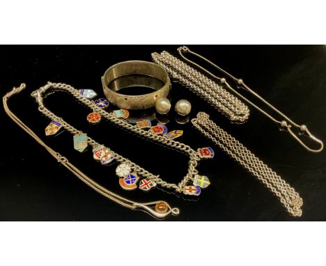 Silver necklaces, bangle, chain with charms and a pair of earrings 