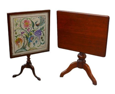 Two small mahogany tilt top occasional tables, one with plain square top, 62 by 50.5 by 58.5cm high, the other with an embroi