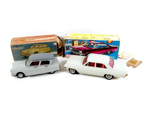 Two boxed model cars, comprising a French Joustra Citroen Ami6, in grey, with pull back and go action, and a clockwork Gama o