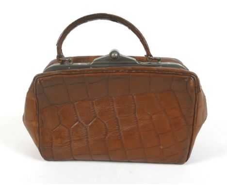 A Vintage Crocodile leather Gladstone style bag 26 by 9 by 22 cm tall 