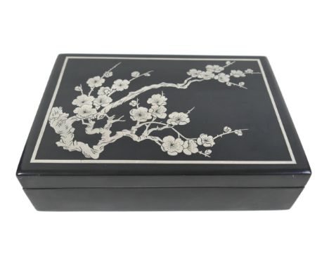 A Japanese silver inlaid black lacquer box with Cherry blossom decoration 27cm by 19cm by 7cm 