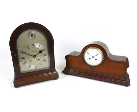 An Edwardian chiming mantle clock by W. Bruford &amp; Son, Eastbourne &amp; Exeter, with brass bun feet and a raised moulded 