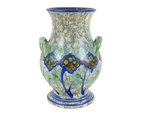 A Swedish Arts and Crafts Upsala Ekeby vase, with twin handles, decorated in greens and blues, incised numbers 1584 and D1544