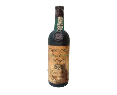 Vintage port: a bottle of 1977 Taylor's tawny port, wax capsule, U: base of shoulder. 