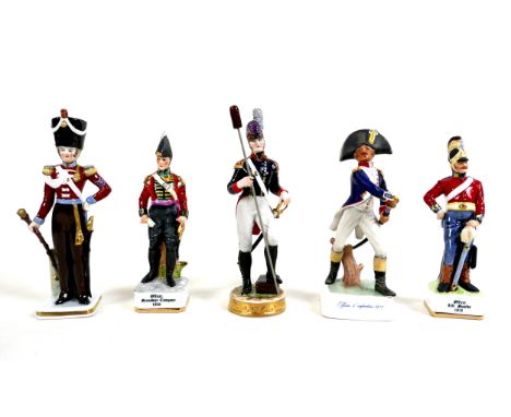 A group of five china figurines, of military interest, including a Goebel 'Officier d'infanterie 1812', model 1968 LF9, 21cm 
