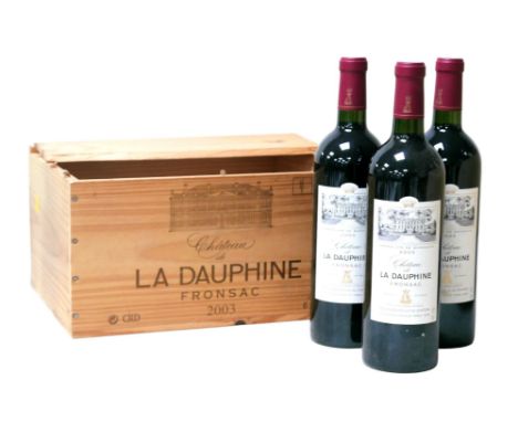 Vintage wine: three bottles of 2003 Chateau de la Dauphine Fronsac, U: all above shoulder, in opened OWC. 