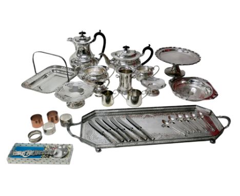 A collection of assorted silver plated wares, including tea wares, a silver napkin ring, silver handled butter knives, 0.7toz