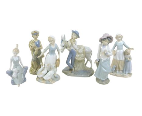 A group of Spanish figurines, including one Nao figurine, one Miquel Requena figurine, 'Ricardo', 25cm high, and three unmark