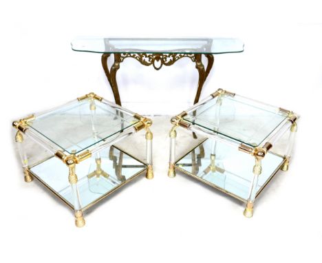 A pair of lucite and brass effect coffee tables, with bevelled glass tops and a mirrored glass shelf below, each 60 by 60 by 