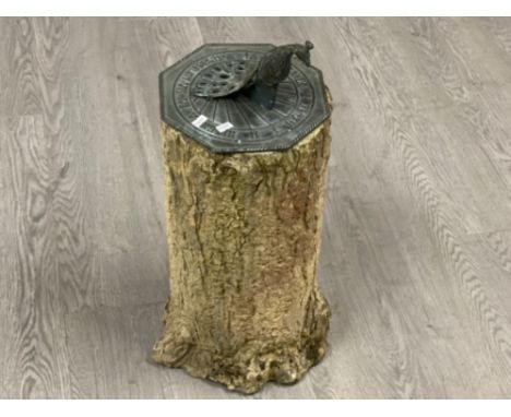 Vintage Metal peacock sundial on garden concrete tree trunk ornament 