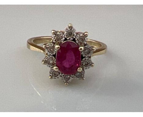 Ladies 9ct gold pink and white stone cluster ring. 2.6g size J1/2