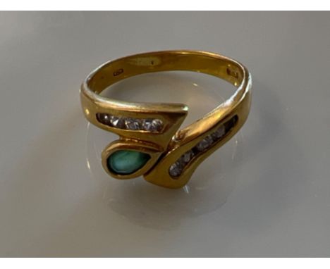 Ladies 18ct gold emerald and white stone ring. Size P 4.4g