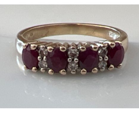 Ladies 9ct gold ruby and white stone ring. 2.6g Size M1/2