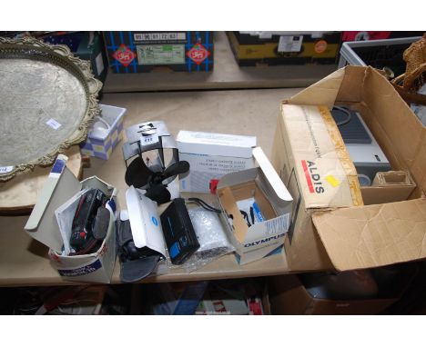 A heat powered stove fan (working at time of lotting) Aldis projector and cameras, etc.,